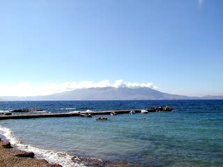Ravdoucha, tiny harbour, small boats, across the bay is Gramvousa peninsula.