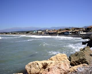 Sea front tavernas seen from Mylos, Kolimbari, Chania, Crete.